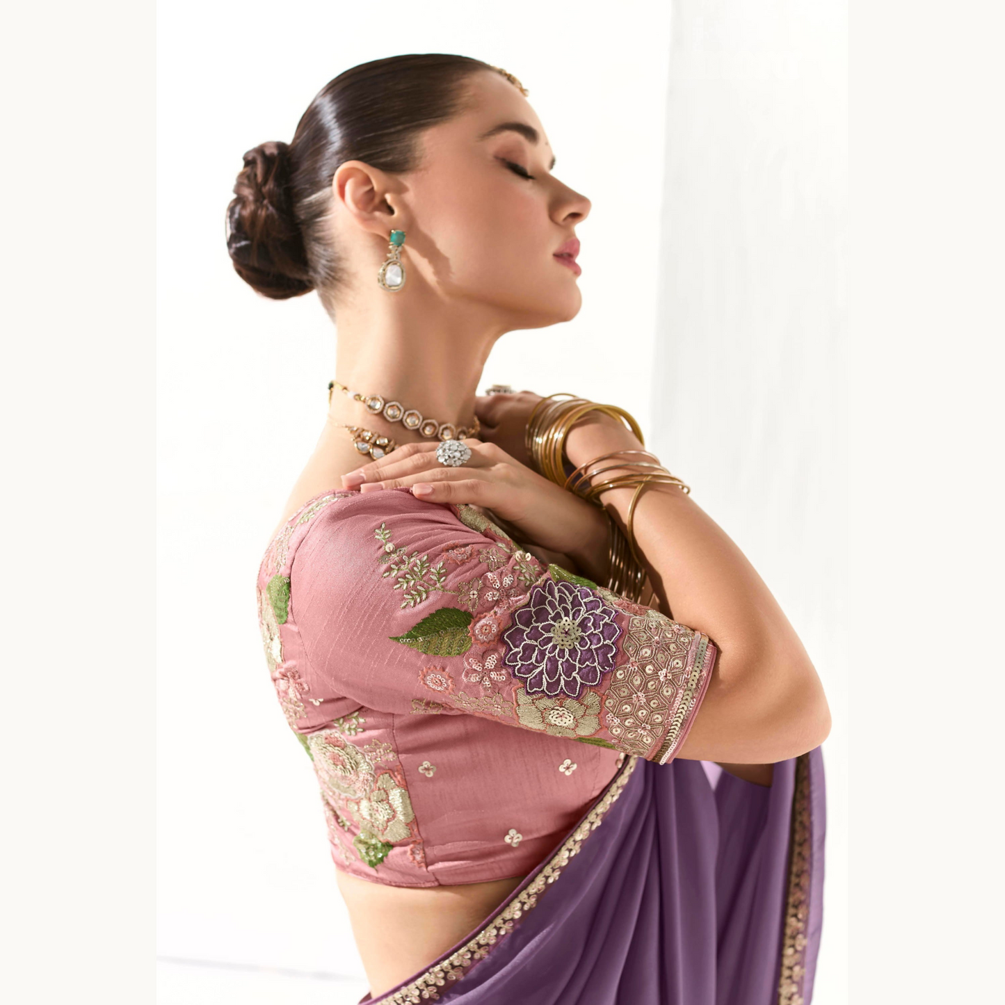 purple shade with a gold Runway Organza Tissue Saree with Heavy Embroidered Border