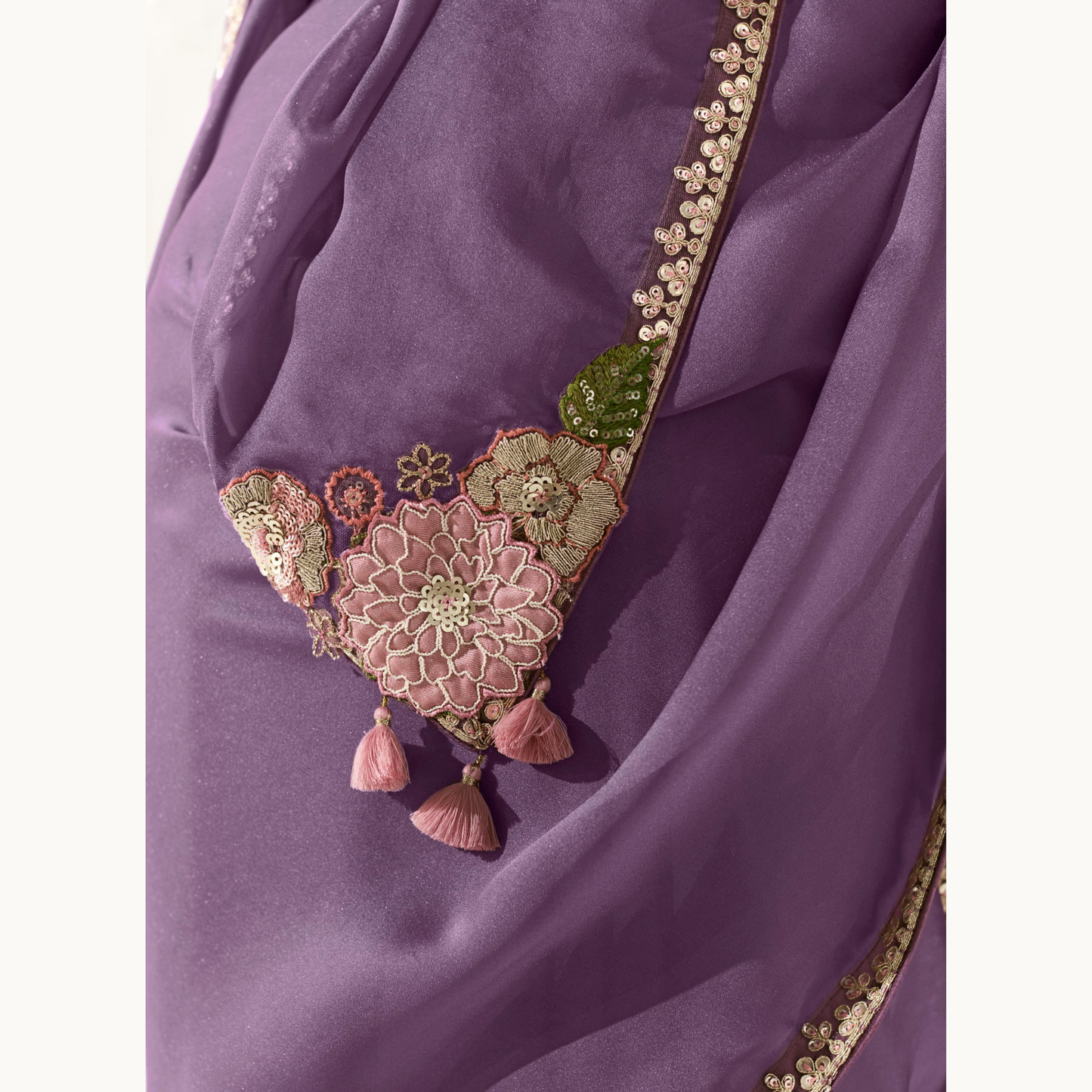 purple shade with a gold Runway Organza Tissue Saree with Heavy Embroidered Border
