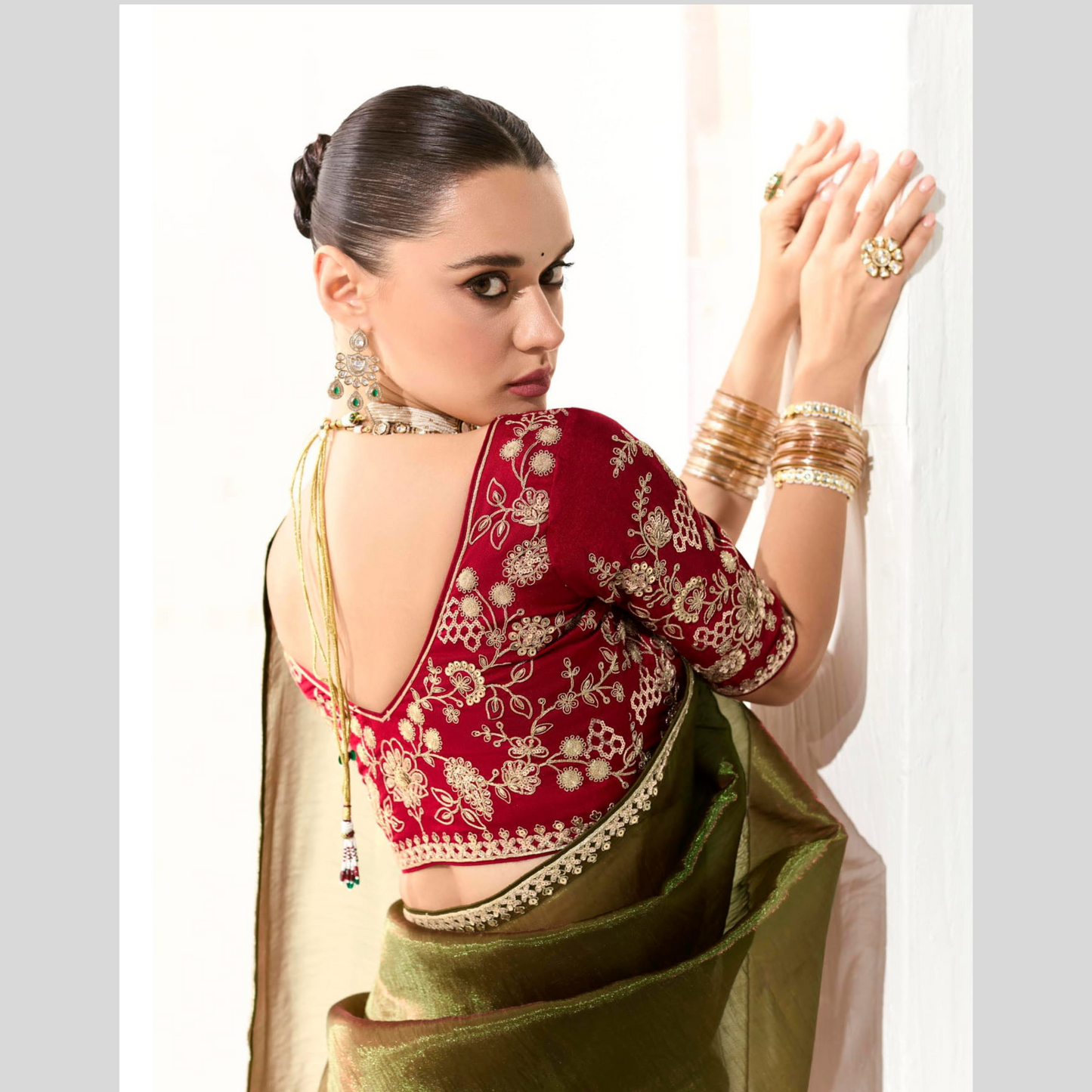 olive green Runway Organza Tissue Saree with Heavy Embroidered Border