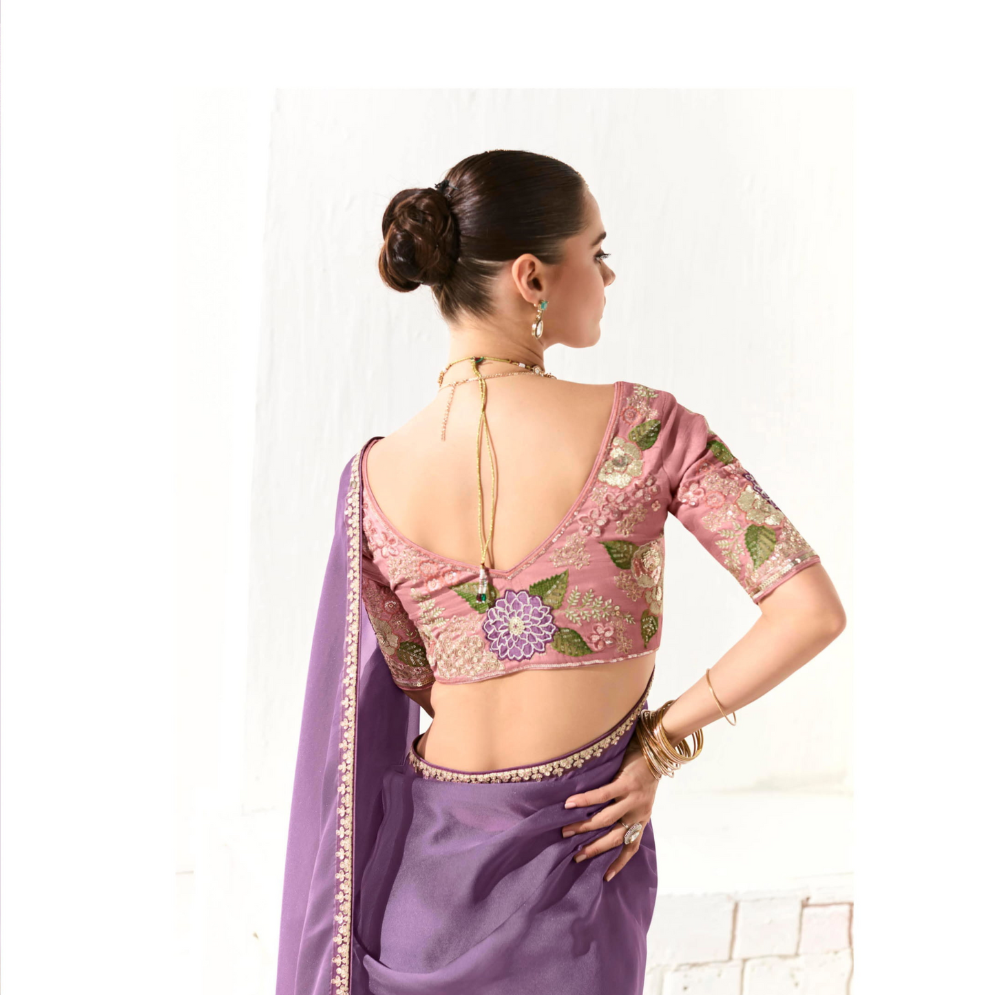 purple shade with a gold Runway Organza Tissue Saree with Heavy Embroidered Border