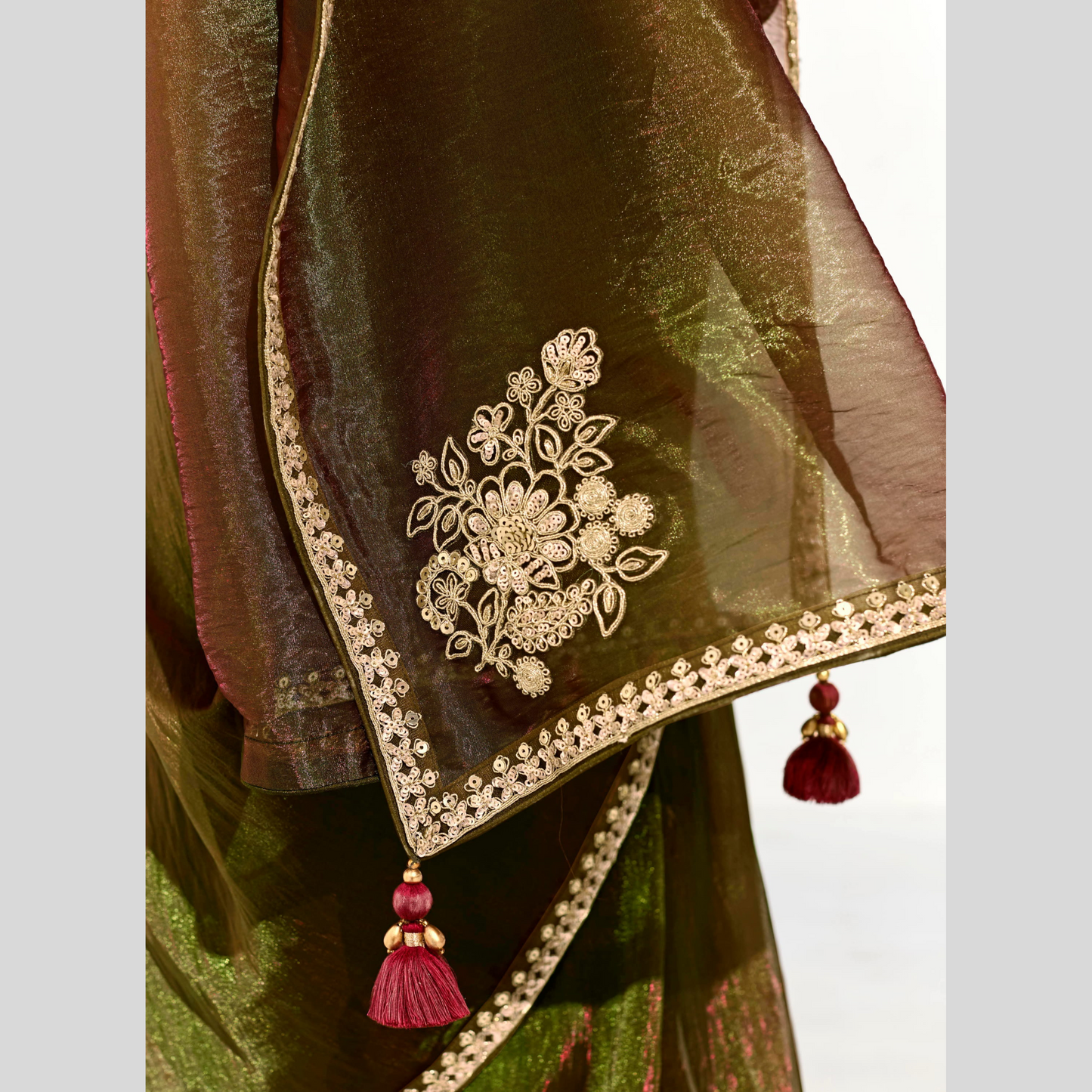 olive green Runway Organza Tissue Saree with Heavy Embroidered Border