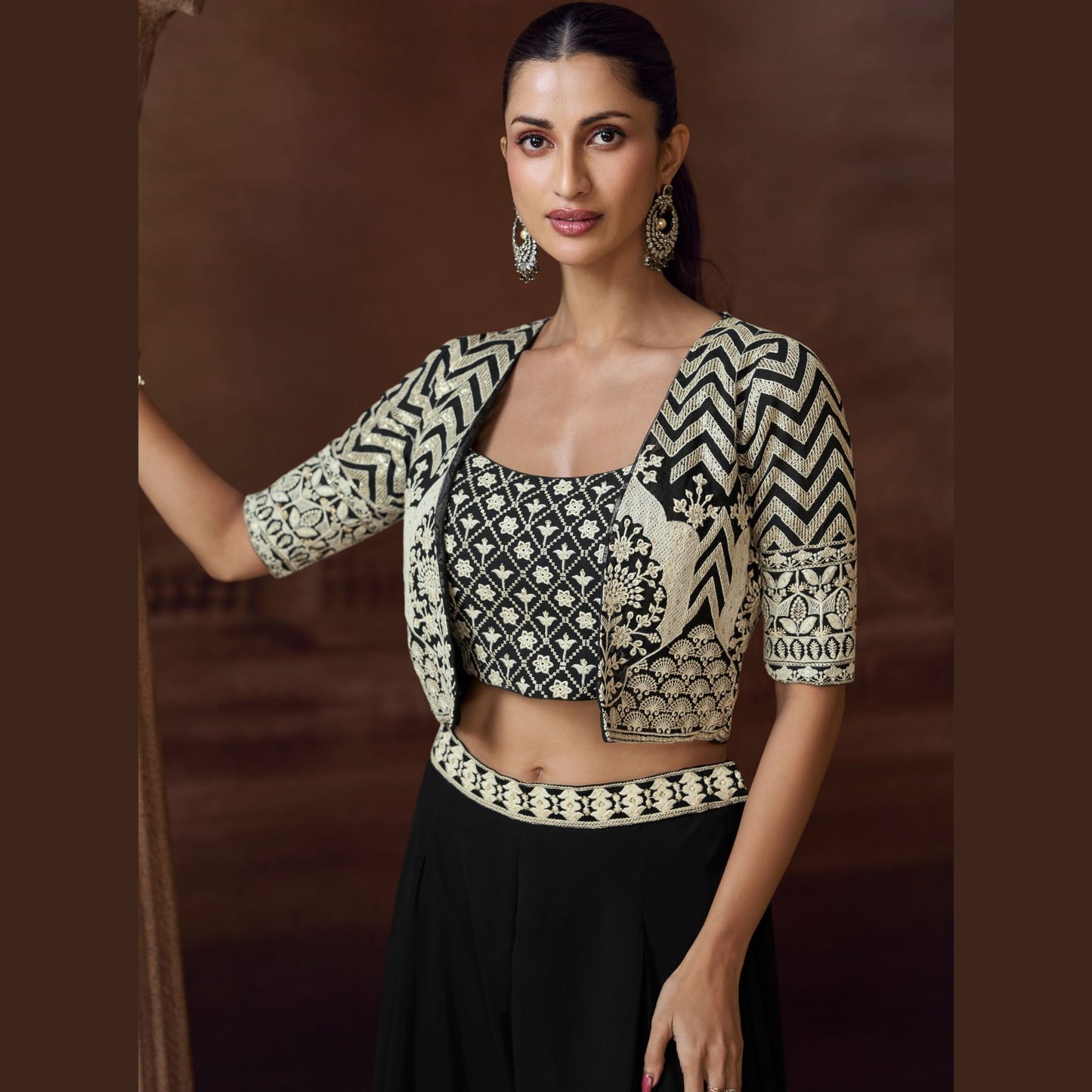 Ziva Noir palazzo with intricately embroidered crop top and geometric mirror-work jacket