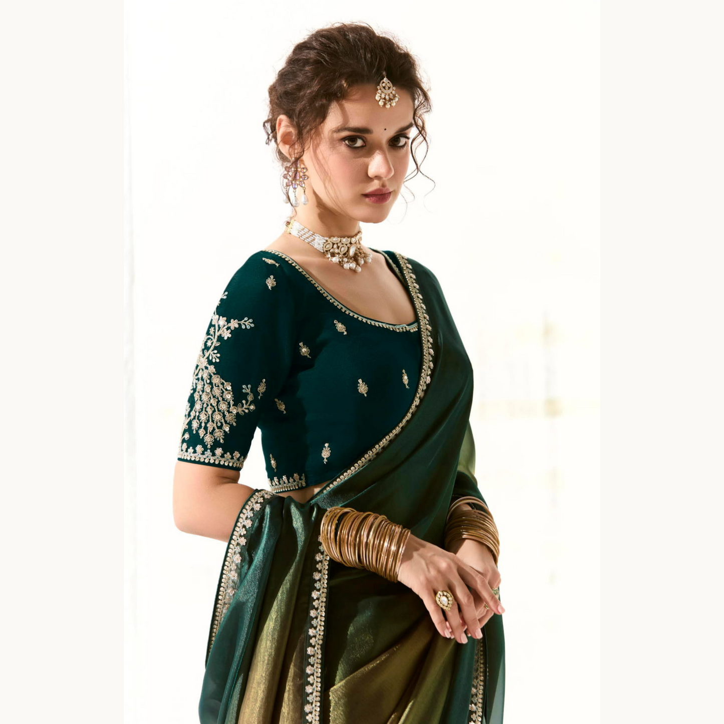 Dark green with gold Runway Organza Tissue Saree with Heavy Embroidered Border