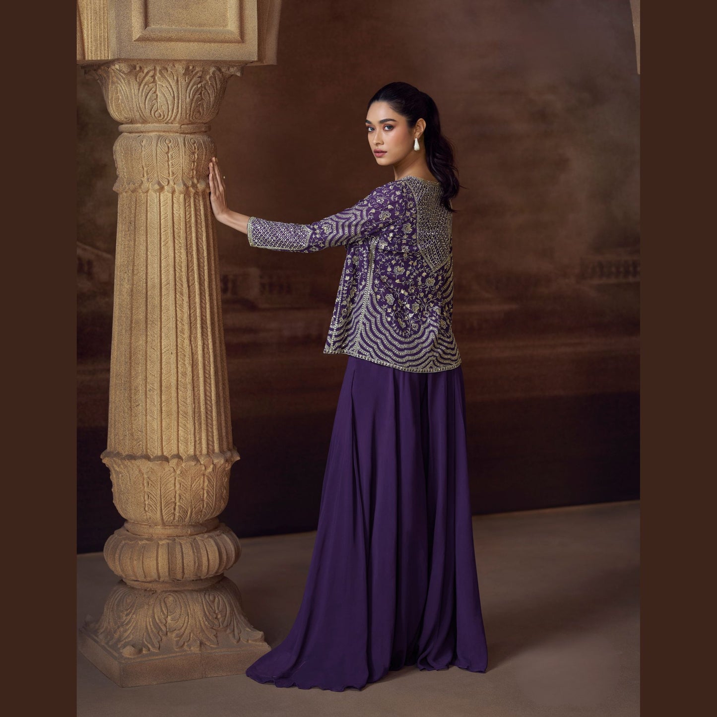 Ira Midnight palazzo set with sequin-embroidered bustier and jacket in zari