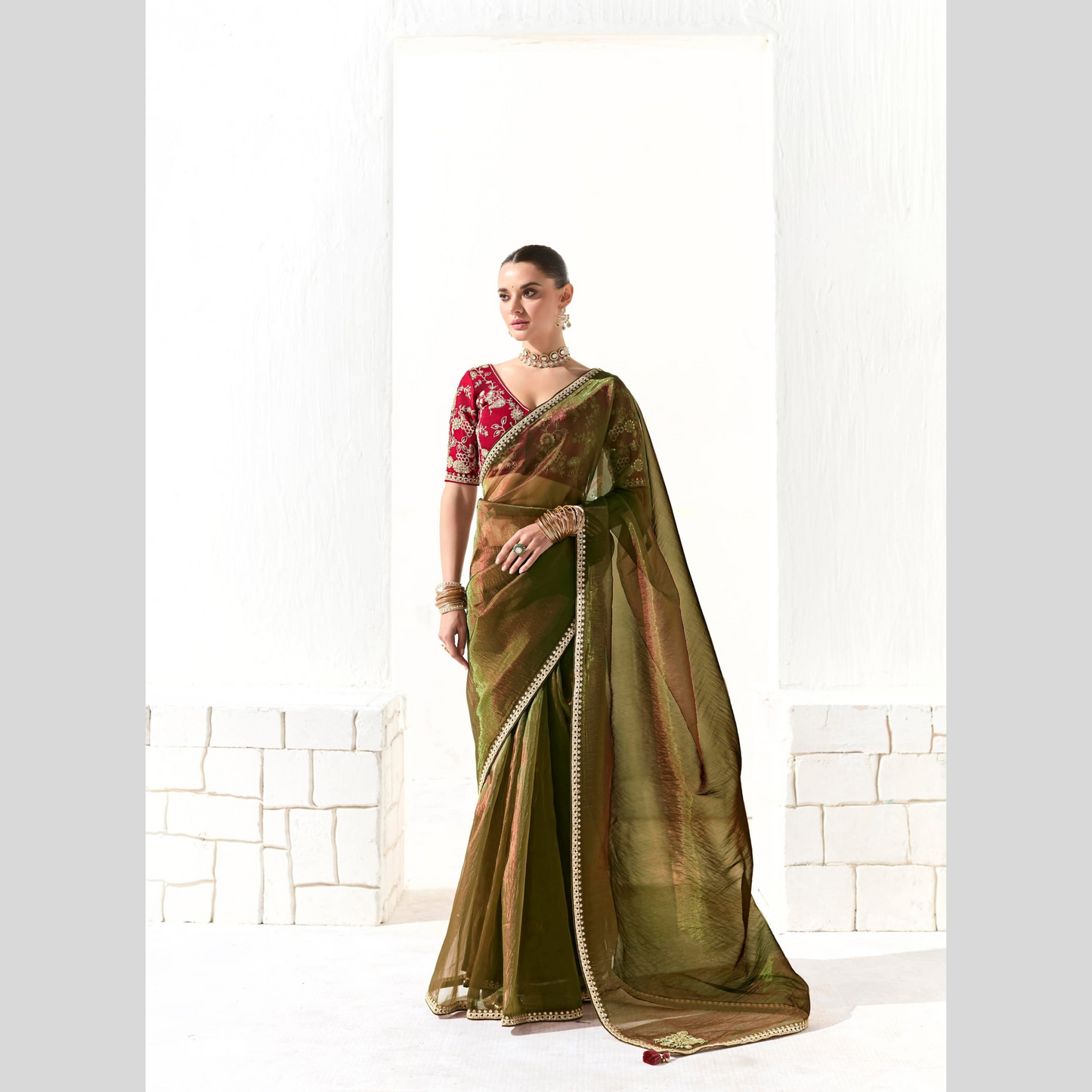olive green Runway Organza Tissue Saree with Heavy Embroidered Border