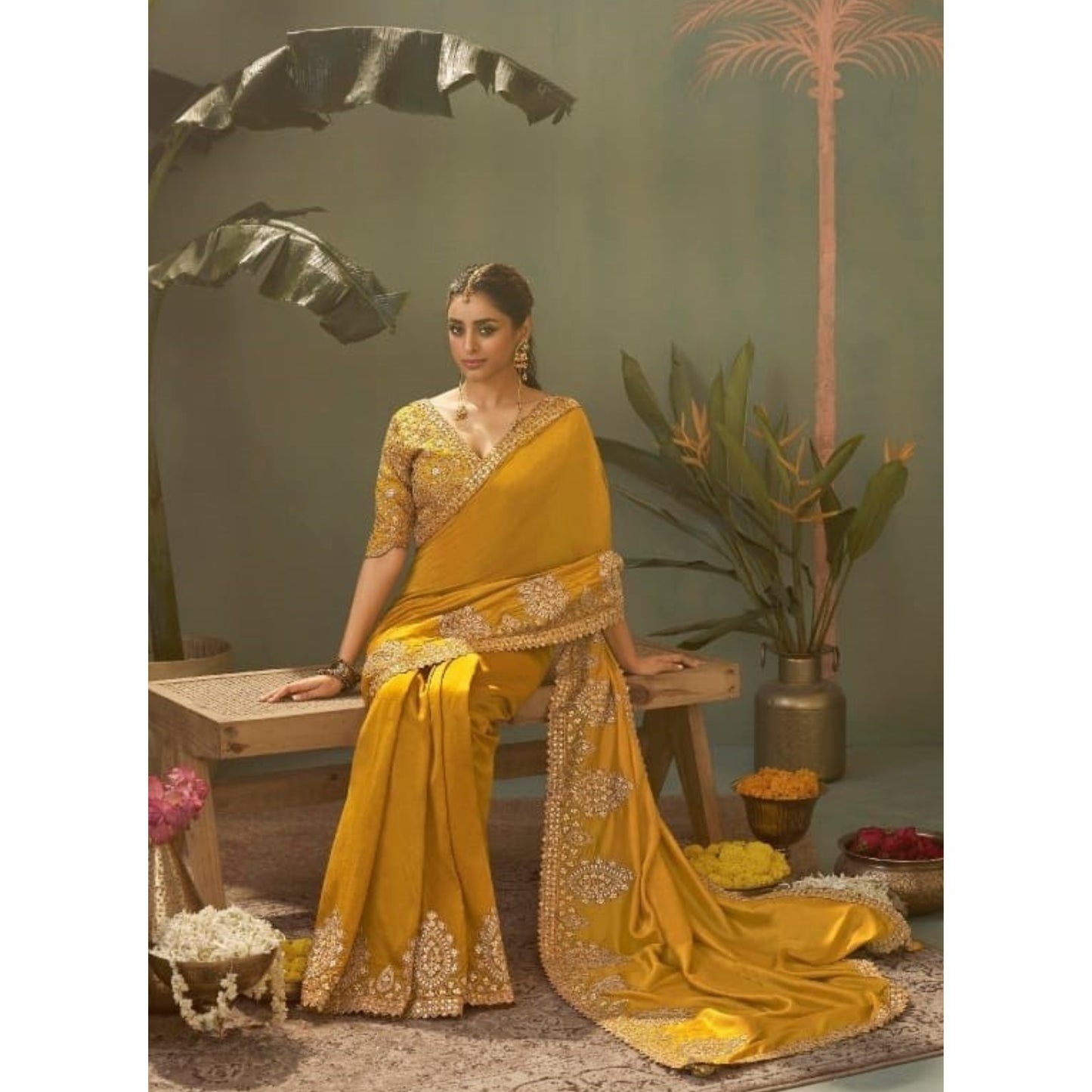 Saanvi Gold Regal Embroidered Saree