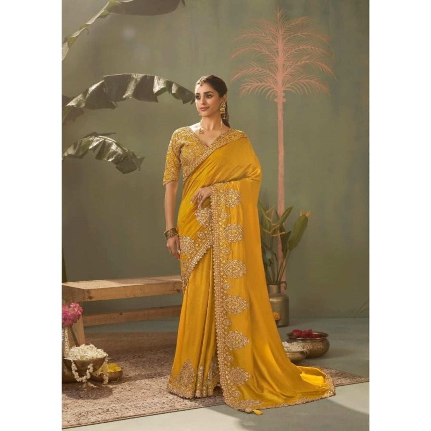 Saanvi Gold Regal Embroidered Saree