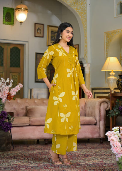 Cotton Charm Printed Kurti with Pocket &amp; Embroidered V-Neck, Paired with Printed Pant