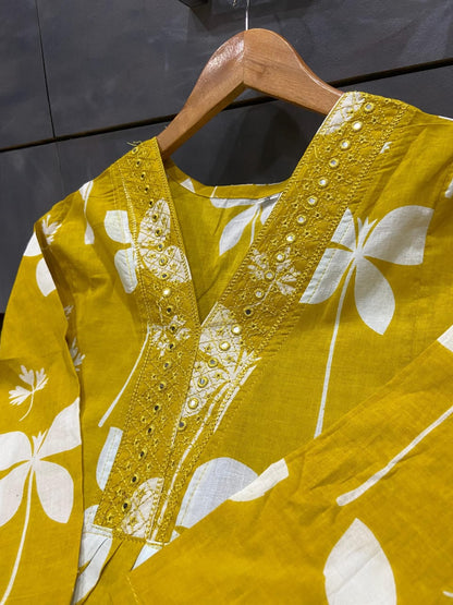 Cotton Charm Printed Kurti with Pocket &amp; Embroidered V-Neck, Paired with Printed Pant