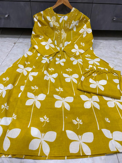 Cotton Charm Printed Kurti with Pocket &amp; Embroidered V-Neck, Paired with Printed Pant